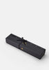Skultuna Kin accessories featuring modern design with sleek metallic finishes, displayed on a neutral background.