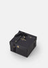 Skultuna Pomme accessories featuring a sleek, modern design with smooth metallic finish and minimalist style.
