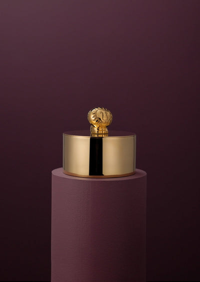Skultuna Box designed by Lisa Larson, showcasing a stylish accessories box with intricate patterns and a sleek, modern design.