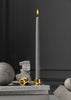 Skultuna Bijou candle holder with elegant metallic design, showcasing a sleek accessory for modern home decor.