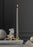 Skultuna Bijou candle holder with elegant metallic design, showcasing a sleek accessory for modern home decor.