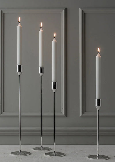 Silver plated Nattlight candlestick by Skultuna, featuring a sleek, modern design and polished silver finish.
