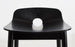 Black Mono Counter Chair by Woud Denmark, modern seating with sleek design and metal legs, ideal for kitchens or bars.