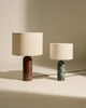 Emerald marble Gubi Gravity table lamp with a sleek modern design, featuring a balanced, sculptural lighting fixture.