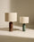 Emerald marble Gubi Gravity table lamp with a sleek modern design, featuring a balanced, sculptural lighting fixture.