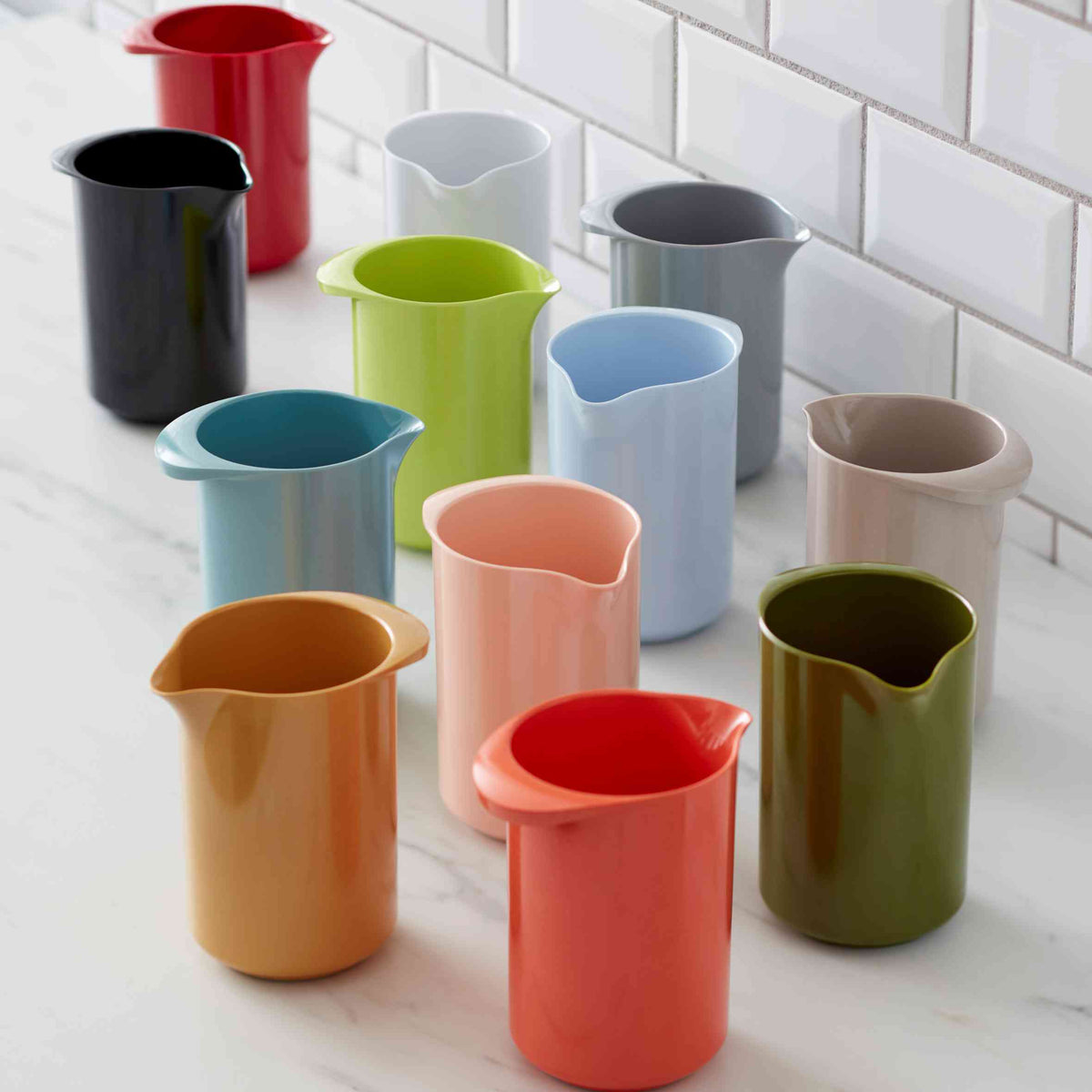 Rosti Classic Mixing Jug in stainless steel, with a handle and spout for easy pouring, used as a kitchen accessory.