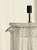 Ripple Thermal French Press by Ferm Living, a stylish glass coffee press with a ripple-patterned thermal sleeve and sleek handle.
