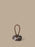 Ferm Living Wa door stopper accessory in sleek, modern design, made of durable material, placed on a wooden floor.