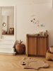 Ferm Living Apple Braided Storage for kids in vibrant colors, featuring a braided design and spacious interior for organizing toys.