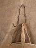 Ferm Living Curvature Double Hook in black metal, wall-mounted accessory with two hooks for hanging coats or accessories.