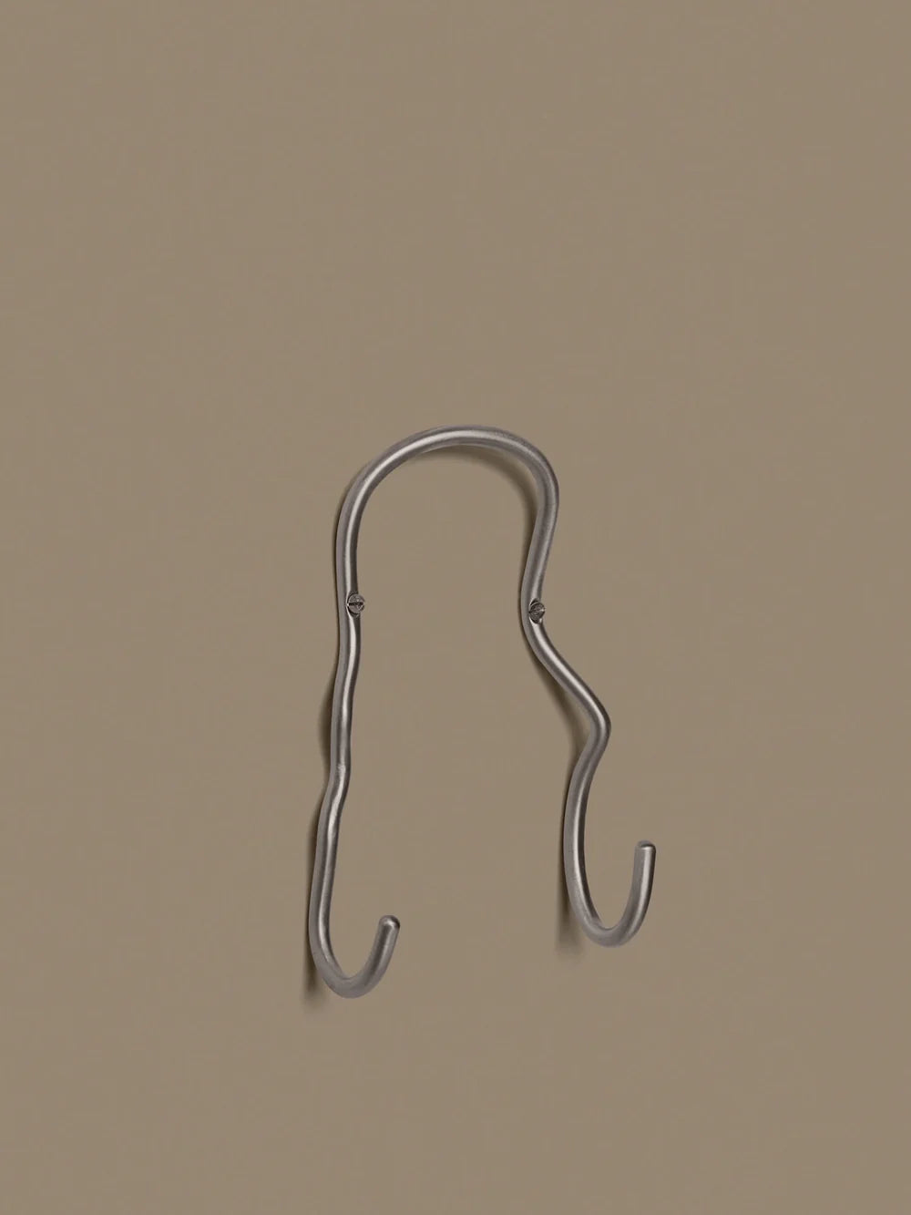 Ferm Living Curvature Double Hook in black metal, wall-mounted accessories hook with sleek, modern design.