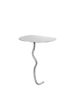 Ferm Living Curvature Wall Table mounted on wall, showcasing sleek modern design and smooth curved surface in a contemporary interior setting.