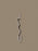 Ferm Living Curvature Hook in black, minimalist metal wall hook for accessories, mounted on a white wall.