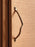 Ferm Living Curvature Handle in natural wood finish, modern accessory for furniture or cabinetry, with smooth curved design