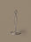 Ferm Living Curvature Paper Towel Holder in black with curved metal design for kitchen or bathroom accessories.
