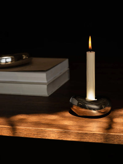 Ferm Living Bellure candle holder accessory with a sleek, modern design featuring a metallic finish and minimalist style.