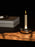 Ferm Living Bellure candle holder accessory with a sleek, modern design featuring a metallic finish and minimalist style.