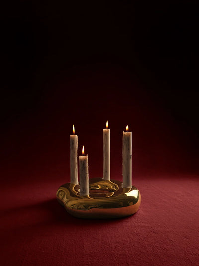 Bellure ring candle holder by Ferm Living in a sculptural, rounded design for tabletop candle display