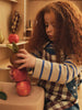 Ferm Living Bothy Kids Kitchen Set featuring colorful wooden utensils and accessories for imaginative play.