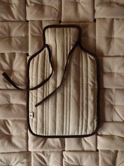 Ferm Living Vari hot water bottle cover in soft fabric with a modern, minimalist design suitable for accessories.