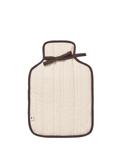 Ferm Living Vari hot water bottle cover in soft fabric with a cozy, stylish design for added comfort and warmth.