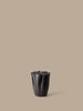 Ferm Living Dedali Vase, a modern ceramic accessory with a textured, geometric design in neutral tones.