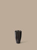 Ferm Living Dedali vase with a textured, geometric design in neutral tones, used as a decorative accessories piece.