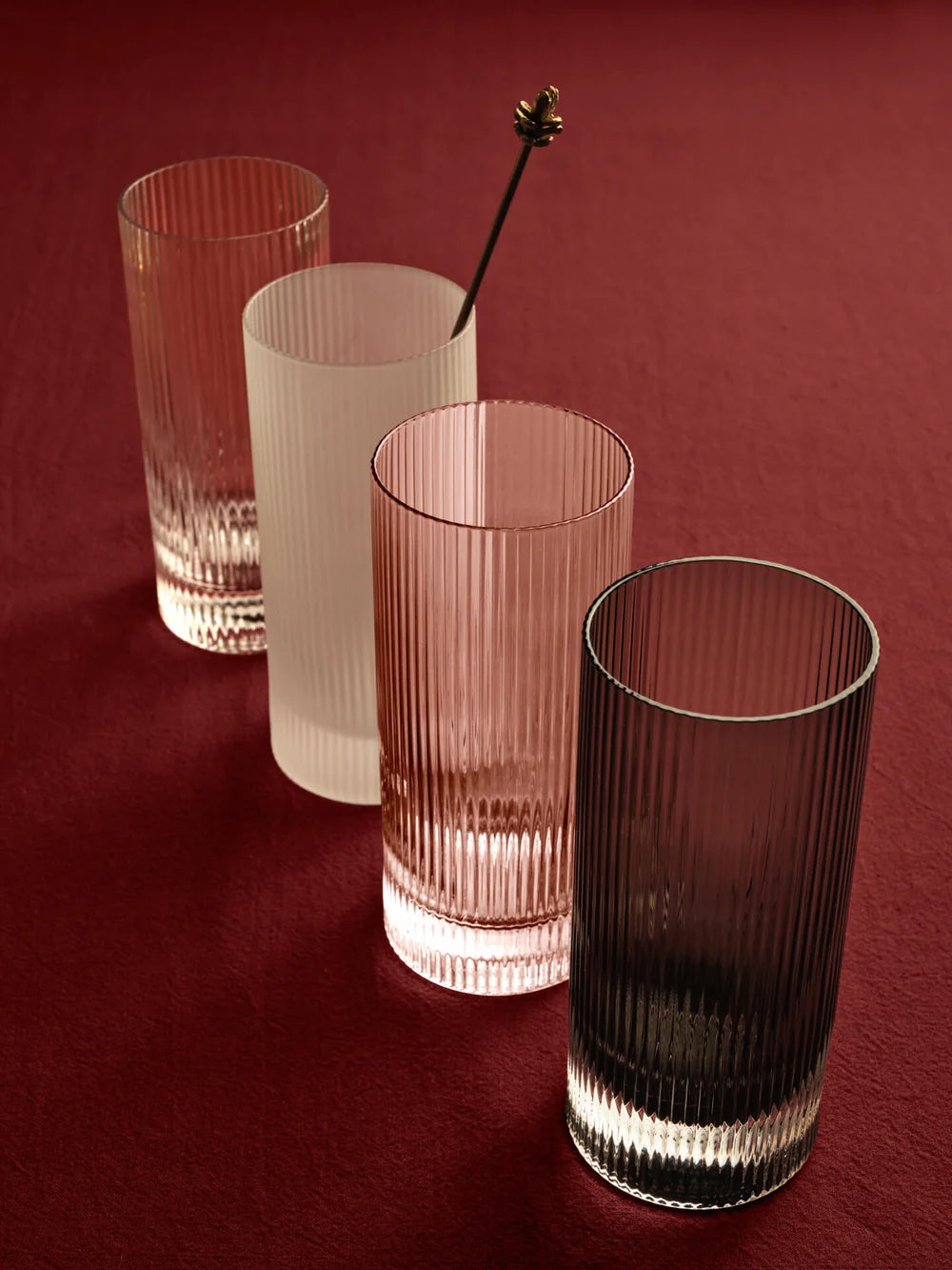 Set of two Ferm Living Ripple Highball Glasses with textured, wavy design, perfect for stylish drinking accessories.