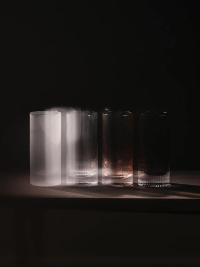 Set of two Ferm Living Ripple Highball Glasses with textured, wavy design perfect for stylish beverages and entertaining.