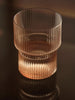 Set of four Ripple glass accessories by Ferm Living featuring textured, wavy glass design for stylish home decor.