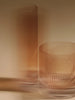 Set of two Ferm Living Ripple Highball Glasses showing textured glass design for stylish beverage serving.