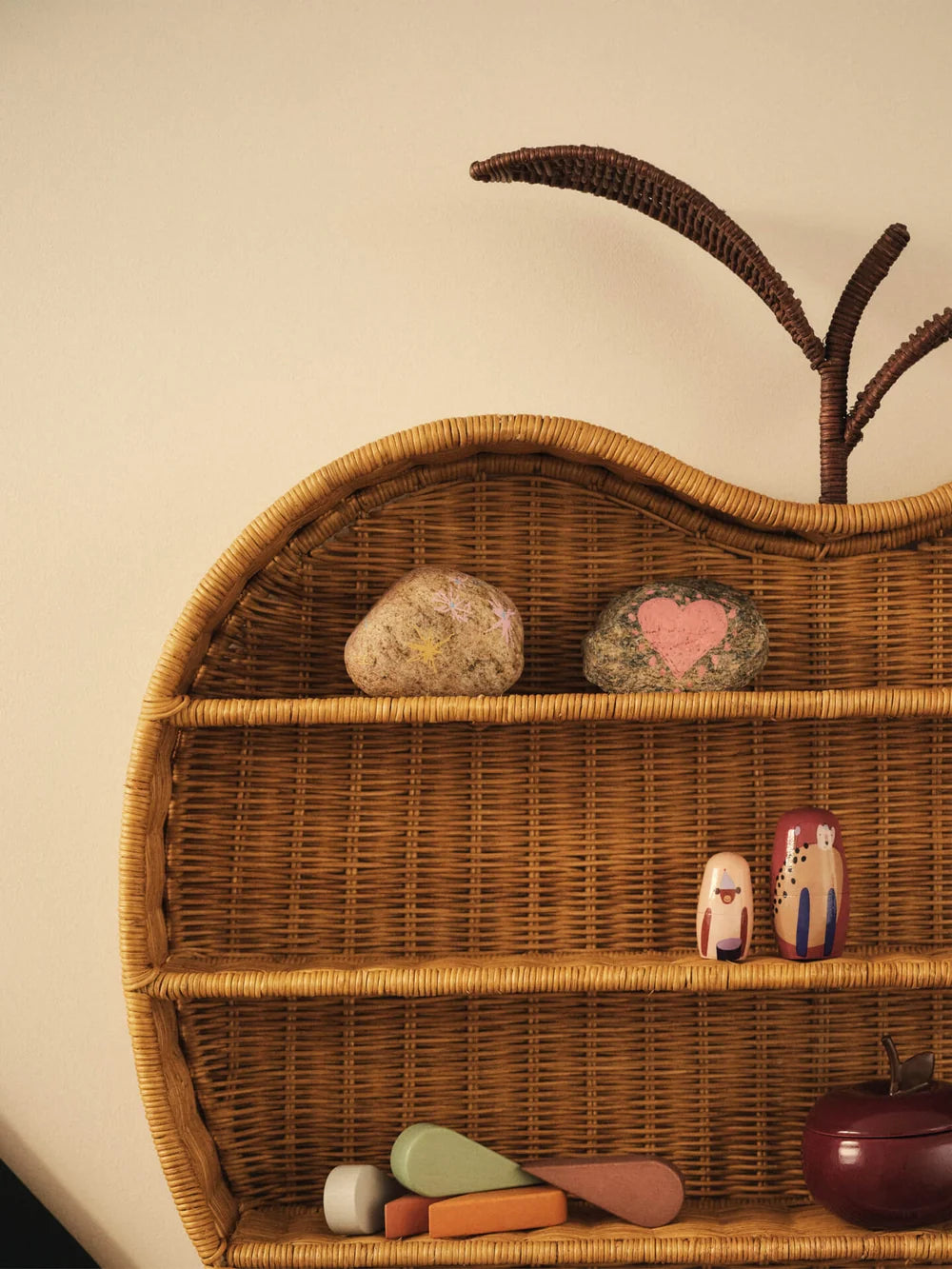 Kids Apple Braided Shelf by Ferm Living featuring a colorful, woven design mounted on a wall for playful storage.