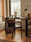 Ferm Living Boda dining chair with arms, modern seating with wooden legs and upholstered cushioned seat, stylish home dining room furniture