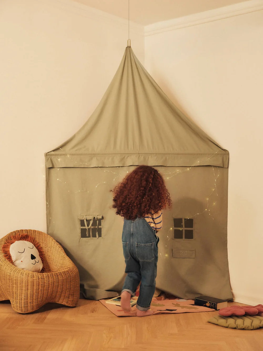 Ferm Living Settle Corner Curtain for kids room, featuring colorful fabric with playful patterns and a cozy, decorative design.