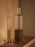 Ferm Living Ripple Oil Bottle accessory with a textured, ripple design in neutral tones, ideal for kitchen or bathroom use.