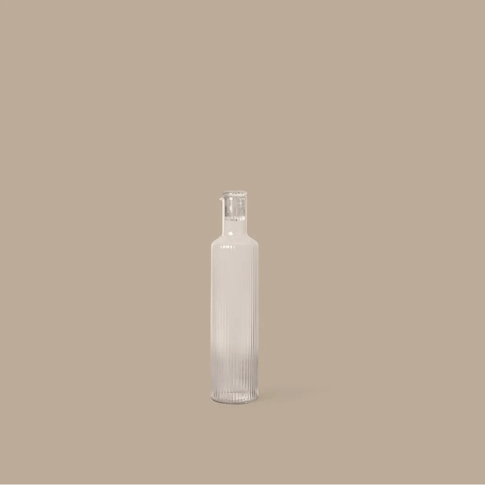 Ferm Living Ripple Oil Bottle accessory with a textured, ripple design in ceramic or glass material.