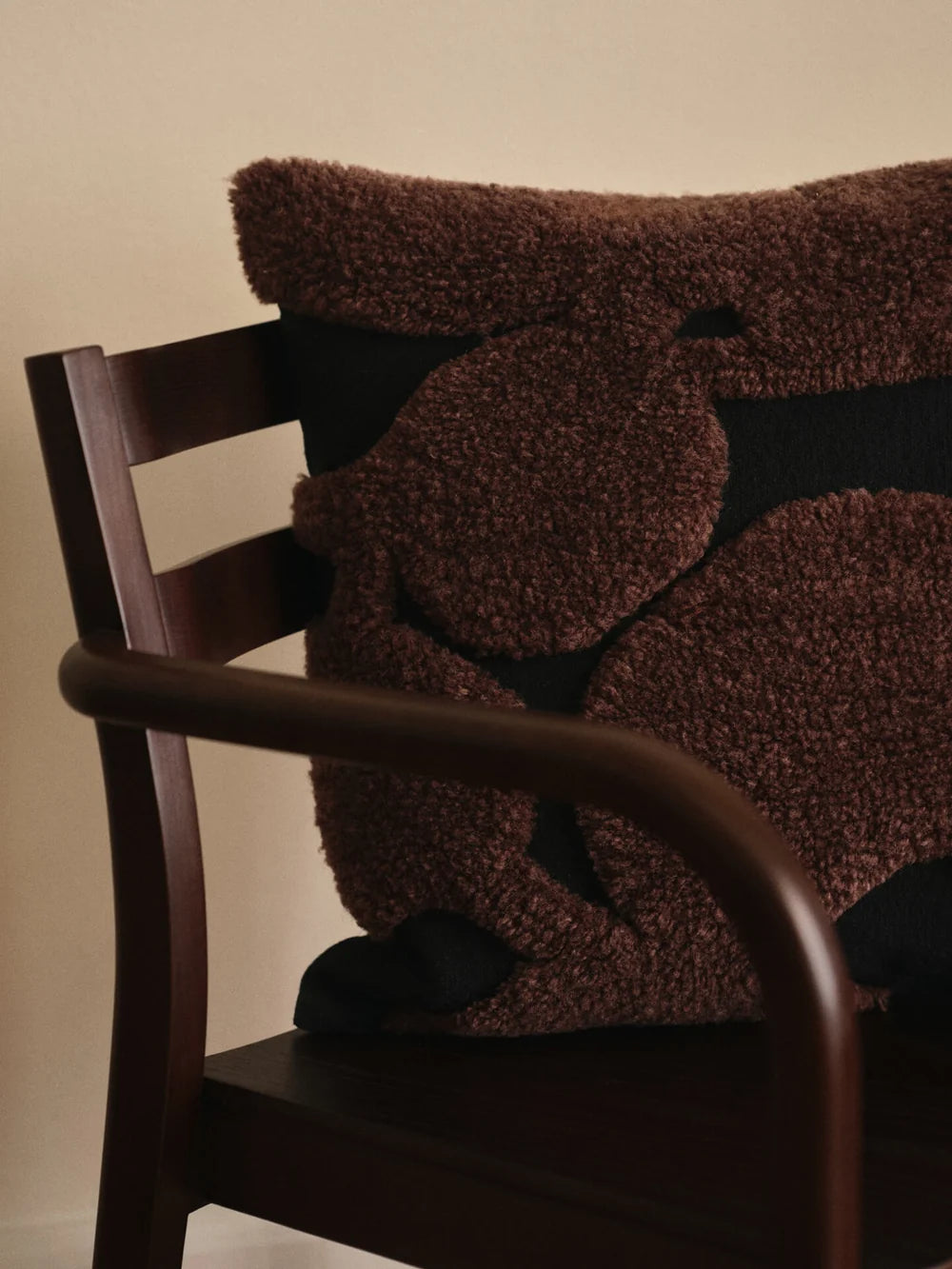Ferm Living Cilla tufted cushion with textured fabric and subtle pattern, perfect for adding comfort and style to sofas or chairs.