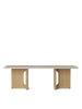 Androgyne Lounge Table by Audo Copenhagen in natural oak with a sleek, modern design and smooth surface.
