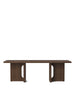 Androgyne Lounge Table by Audo Copenhagen in dark stained oak, showcasing its sleek, modern design and smooth wooden surface.