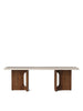 Androgyne Lounge Table by Audo Copenhagen with walnut finish and sleek modern design, shown from the front.