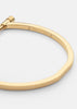 Gold plated Omega bangle by Skultuna, elegant jewelry accessory with sleek circular design and polished finish.