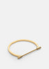 Gold-plated Omega bangle by Skultuna, showcasing a sleek, minimalist jewelry accessory with a polished finish.