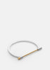 Gold plated Omega bangle by Skultuna featuring polished steel finish, elegant jewelry accessory for stylish wear.