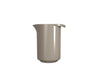 Classic Rosti mixing jug, a durable kitchen accessory with a smooth handle and wide spout for easy pouring.