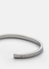 Silver plated SB Cuff Thin by Skultuna, showcasing a sleek, minimalist accessory with a smooth, polished finish.