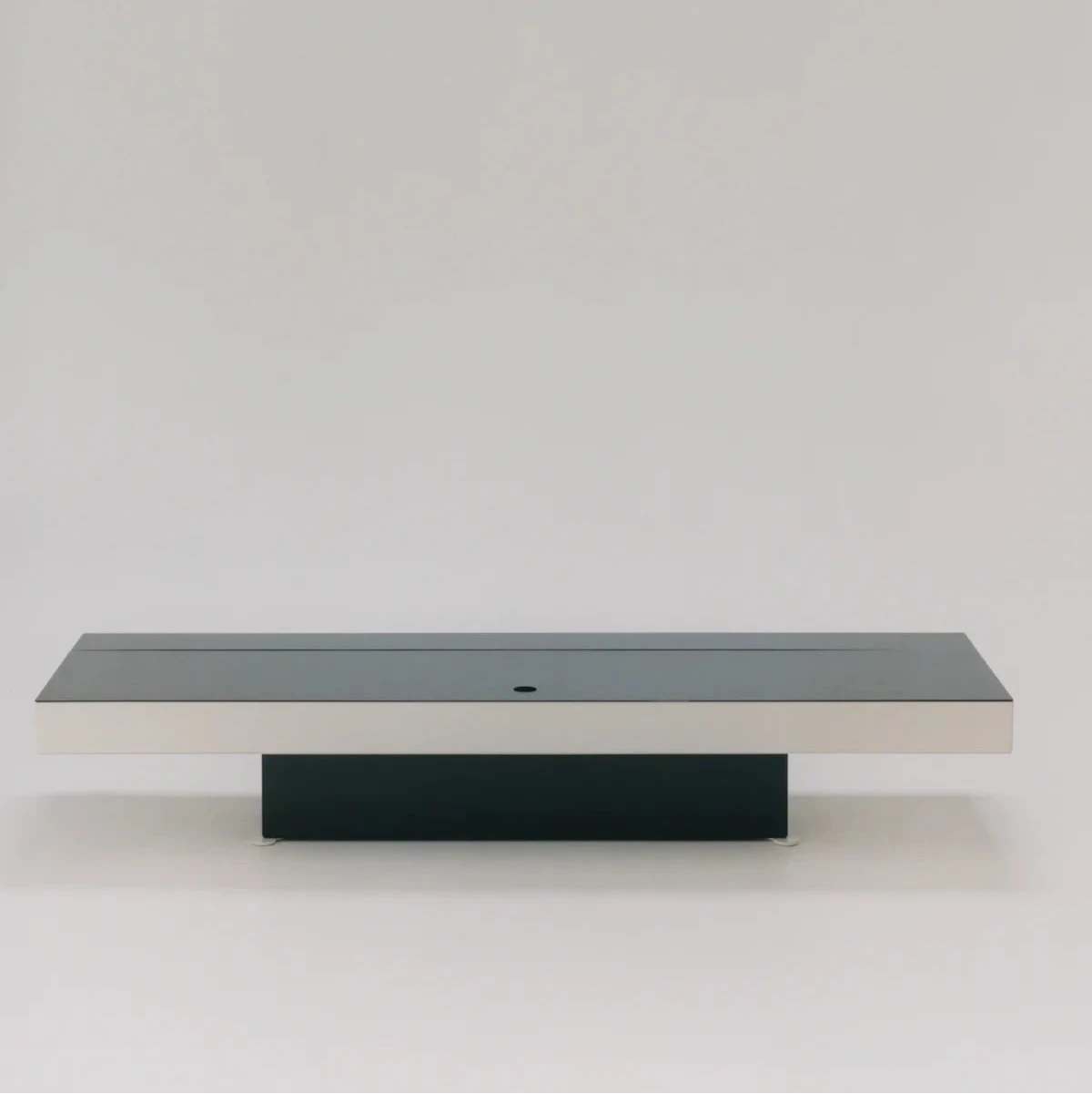 Modern Unit 004 sideboard by New Works, featuring sleek design and wooden finish, perfect for contemporary living spaces.
