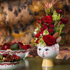Eva Flowerpot by Bjørn Wiinblad, ceramic accessory with colorful floral design, showcasing vibrant, artistic craftsmanship.