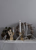 Skultuna Guardian Angel accessory with intricate design, crafted from metal, displayed on a neutral background.