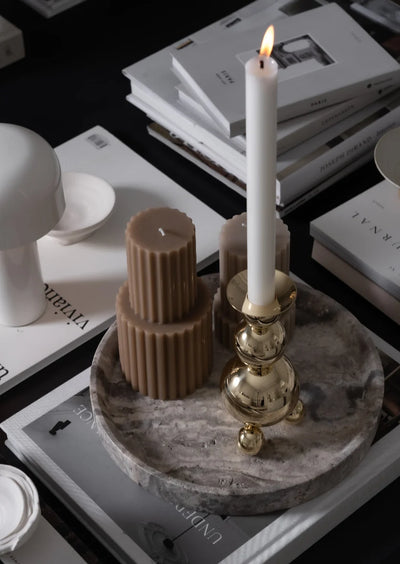 Skultuna Triple Ball Candlestick accessory with three spherical holders for candles, featuring a sleek, modern design.