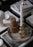 Skultuna Triple Ball Candlestick accessory with three spherical holders for candles, featuring a sleek, modern design.